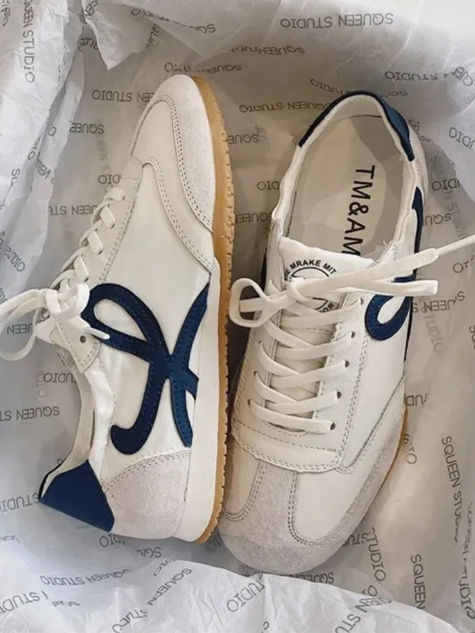 White and navy blue low sneakers shoes